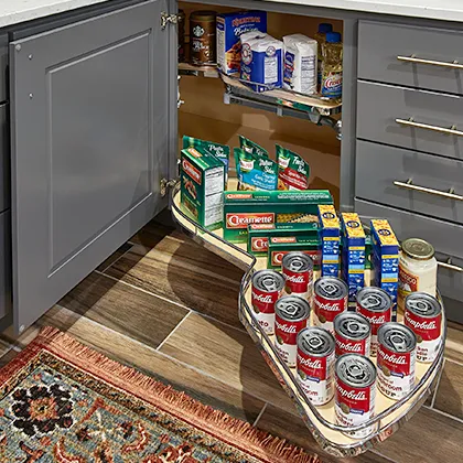 Roll out corner cabinet storage solution normally found on high end cabinets optimize storage