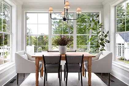 Dining room featuring Marvin Essential Collection double-hung windows