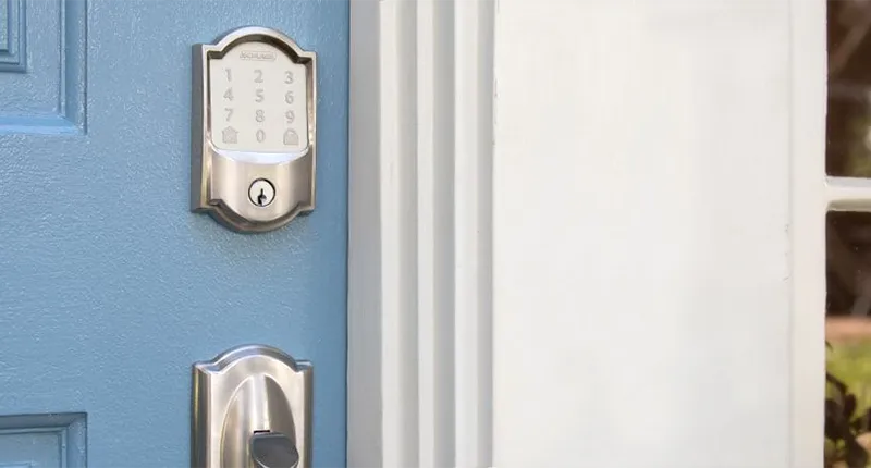 Schlage Encode Smart WiFi Deadbolt installed on blue front entry door