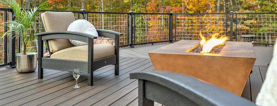This large outdoor living space features a low maintenance composite deck built with Trex deck boards
