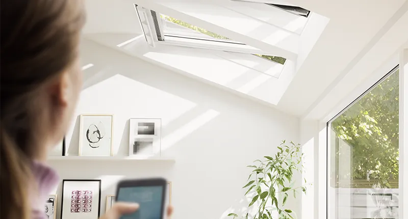 VELUX venting skylights are controlled through a smartphone app for room ventilation