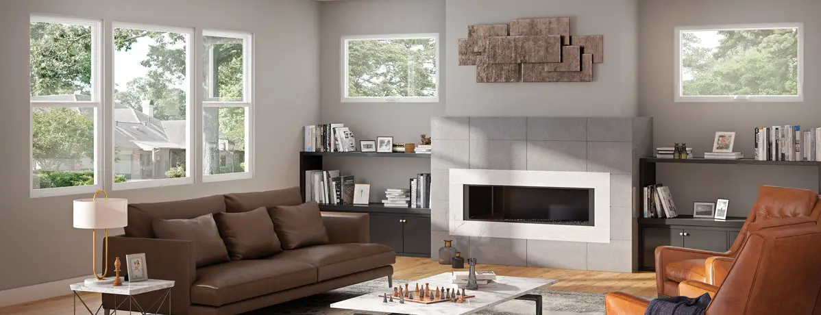 Living room with MILGARD V300 Series Trinsic vinyl windows letting in natural light